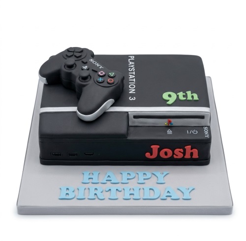 Black PlayStation 3 console cake with a matching controller and custom age topper.