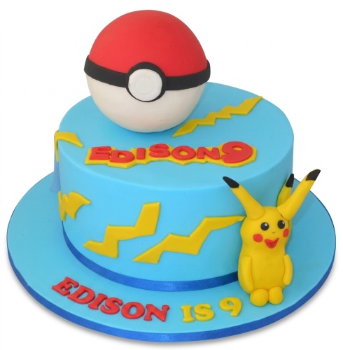 Blue two-tier birthday cake with a 3D Poké Ball topper, Pikachu figure, and yellow lightning bolts, for a personalised kids' birthday.