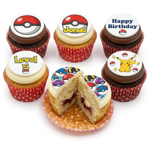 Assortment of Pokémon themed cupcakes with Pikachu, Poké Balls, and custom age/name toppers.