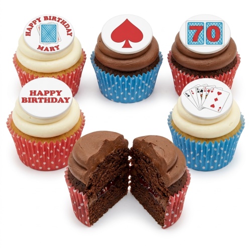 Assortment of card game themed birthday cupcakes with white and chocolate frosting, featuring playing card suit, hand, and custom age toppers.