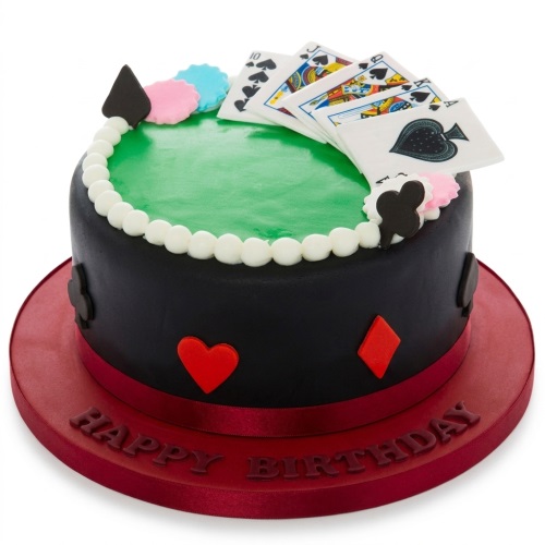 Round black cake with green top, edible playing cards, poker chips, and card suit decorations.