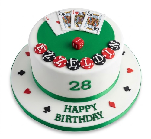 Round white and green casino theme birthday cake with playing cards, a red dice, and poker chips.
