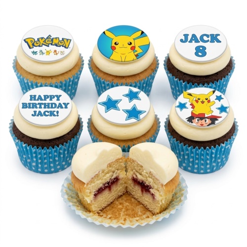 Pokemon themed cupcakes with Pikachu, Ash Ketchum, and logo toppers, along with blue stars.