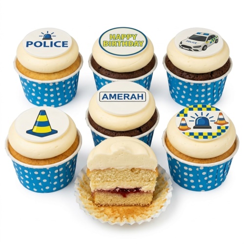 Selection of cupcakes with police car, siren, traffic cone, and 'Police' themed edible toppers in blue polka dot cases.
