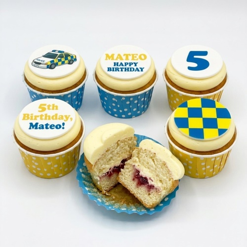 Police car themed birthday cupcakes with blue and yellow checkered pattern and custom age topper.