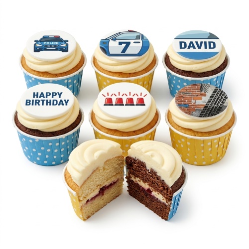 Cupcakes with police cars, sirens, and road texture toppers, in blue and yellow polka dot cases.