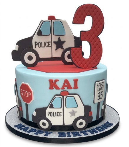 Round blue police car themed birthday cake with a red number topper and 'Happy Birthday' message.
