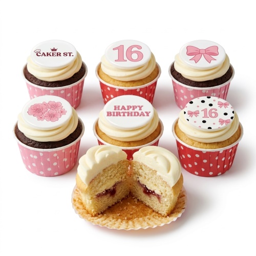 Assortment of pink and white ladies birthday cupcakes with floral, bow, and custom age toppers.