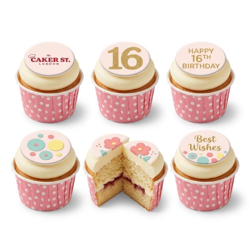 White iced cupcakes in pink polka dot cases with floral, abstract, and custom age toppers.