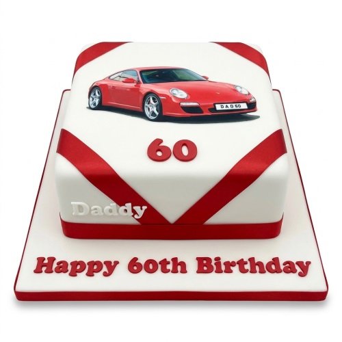 White square birthday cake with red sports car image, red ribbon, and custom age topper.