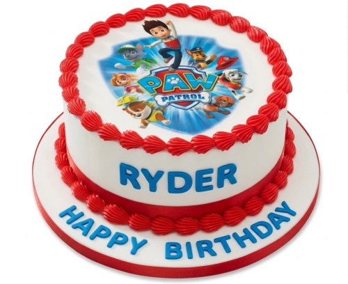 Paw Patrol themed birthday cake with Ryder and pups edible image, red piping, and personalised message.