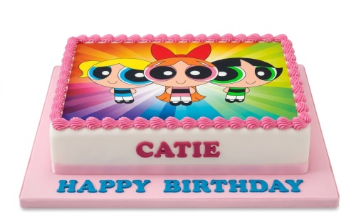 Rectangular white Powerpuff Girls birthday cake with pink piping and custom name.