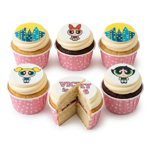 Powerpuff Girls birthday cupcakes with Blossom, Bubbles, Buttercup, and city skyline toppers.