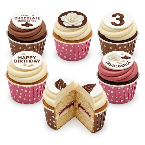 Assortment of floral and chocolate cupcakes with white frosting, some with 'Happy Birthday' and custom age toppers.