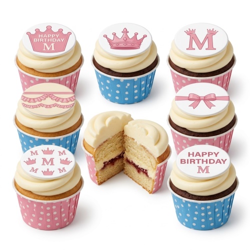Cupcakes with pink crown and custom initial toppers, in pink and blue polka dot wrappers.