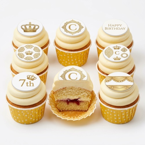 Set of royal crown birthday cupcakes with personalised initial and custom age topper.