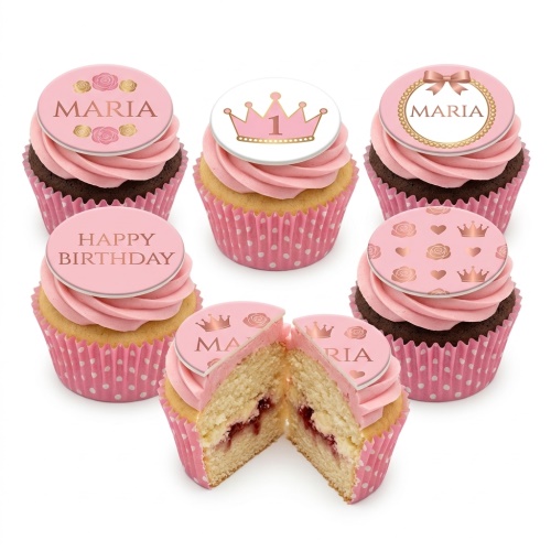 Pink and gold princess birthday cupcakes with crown, rose, heart, and custom name toppers.