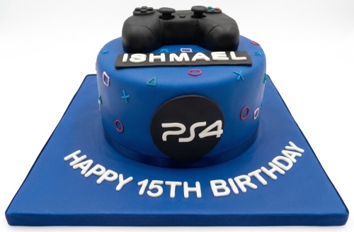 Blue PS4 gaming birthday cake with edible controller, PlayStation logo, and custom name and age.