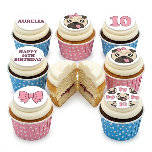 Cupcakes with pug faces, pink bows, and custom age toppers in pink and blue polka dot wrappers.