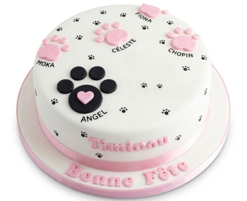 White round cake with pink and black paw prints, a black paw with a pink heart, and a pink ribbon base.