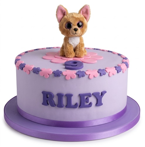 Lavender birthday cake with a plush puppy topper, pink and purple flowers, and a custom age number.