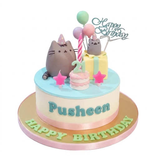 Pusheen themed birthday cake with custom age topper, balloons, and star candles.