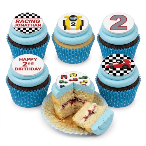 Set of racing car themed cupcakes with light blue frosting, featuring various racing car and checkered flag toppers, and a custom age topper.