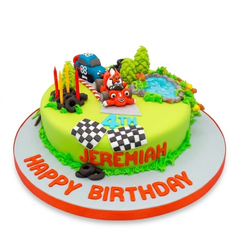 Round green racing car themed birthday cake with blue and red cars, checkered flags, trees, a pond, and candles.
