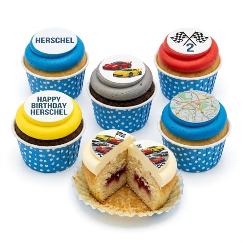 A set of racing car themed cupcakes with blue polka dot wrappers, featuring sports car, racing flag with custom age, and map toppers.