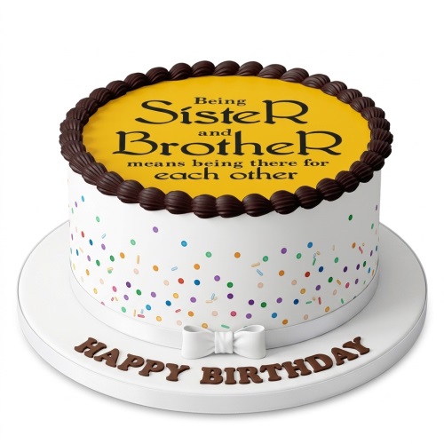 Round white birthday cake with yellow top, chocolate piping, multicoloured sprinkles, and "Happy Birthday" message.
