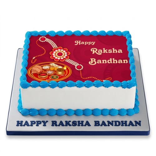 Rectangular Raksha Bandhan cake with red top, blue borders, and edible Rakhi and puja thali design.