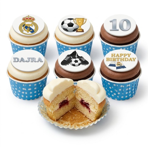 Real Madrid themed birthday cupcakes with footballs, trophy, boots, crest, and custom age topper.
