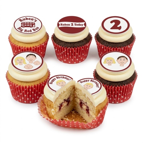 Assortment of kids birthday cupcakes with custom age and family cartoon toppers.