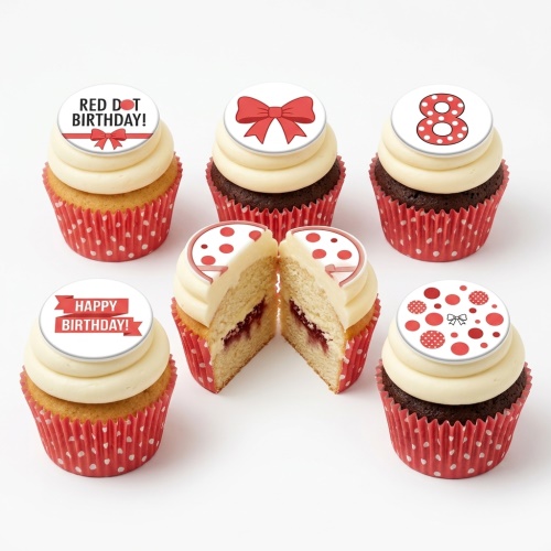 Six red and white polka dot and bow themed birthday cupcakes with a custom age topper.