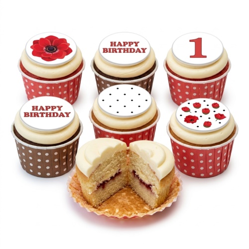 Assortment of floral birthday cupcakes with red poppies, polka dots, and a custom age topper.