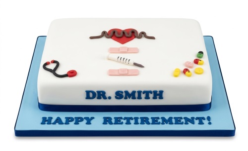 White rectangular cake with medical theme decorations including a stethoscope, heart, plasters, syringe, and colourful pills, with a personalised message.