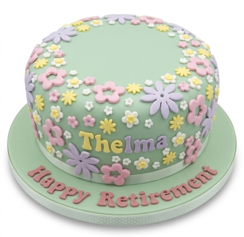 Round pastel green cake with pink, yellow, white, and lilac fondant flowers. Custom name and message.