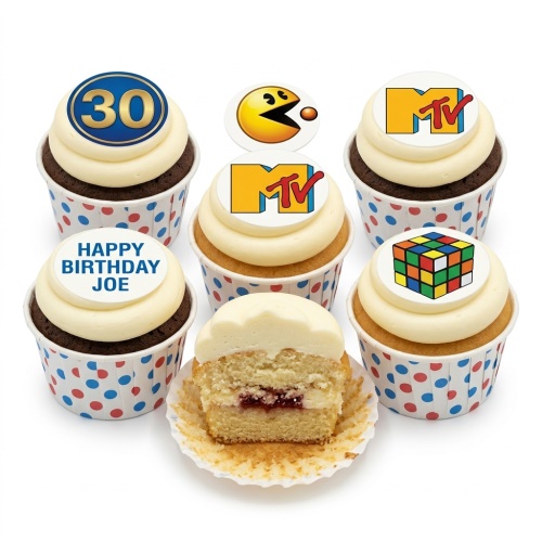 Retro themed cupcakes with Pac-Man, MTV, Rubik's Cube, and custom age toppers.