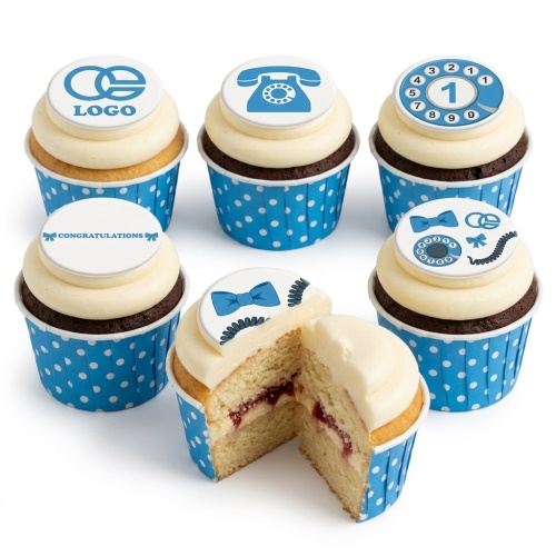 White single-tier cupcakes with a blue retro telephone, blue bow tie, and 'Congratulations' message.