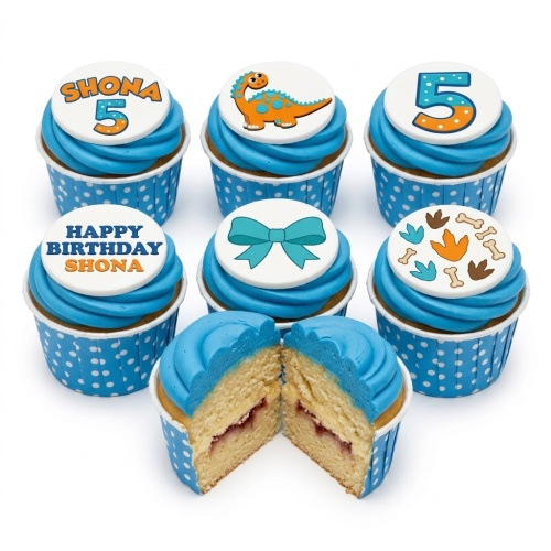 Blue frosted cupcakes with dinosaur, bow, number, and personalised message toppers.