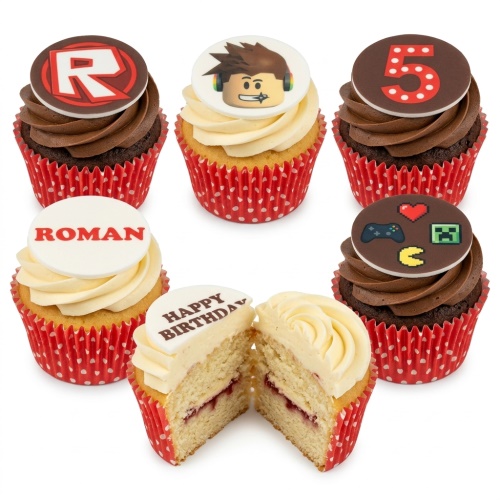 Six Roblox and gaming-themed cupcakes with chocolate and vanilla frosting, custom age, and personalised name topper.