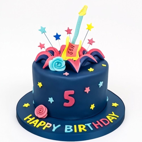 Dark blue birthday cake with a yellow guitar topper, colourful stars, and fondant roses.