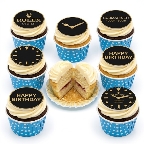 A collection of cupcakes with black and gold Rolex watch themed edible toppers, including Rolex Oyster, Submariner, watch dials, and "Happy Birthday" messages, in blue polka dot cases.