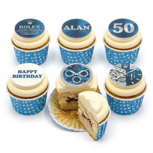 Cupcakes with blue polka dot cases and white frosting, topped with luxury watch dial designs, a Rolex logo, and 'Happy Birthday'.
