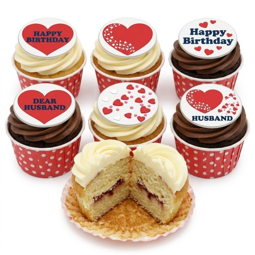 Vanilla and chocolate cupcakes with red and white heart toppers for a birthday celebration.