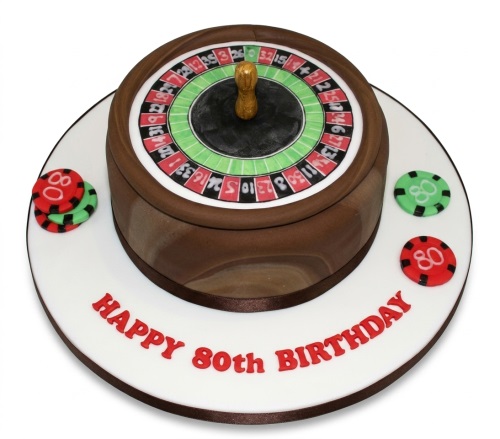 Round 80th birthday roulette wheel cake with poker chips and 'Happy 80th Birthday' message.