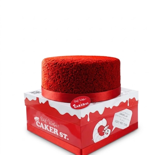 Round red velvet style cake with a red ribbon, presented on a red and white Caker Street box.