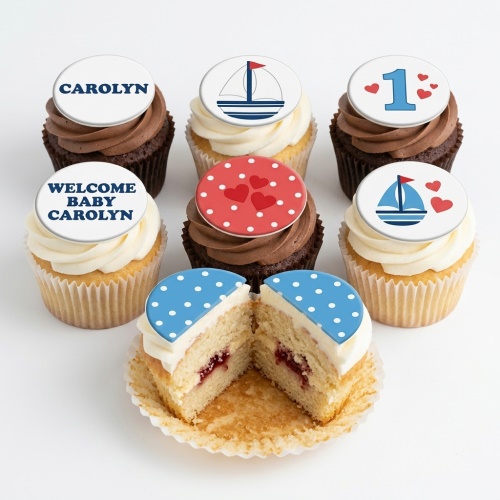 Six cupcakes with sailboat, heart, polka dot, and custom message toppers.