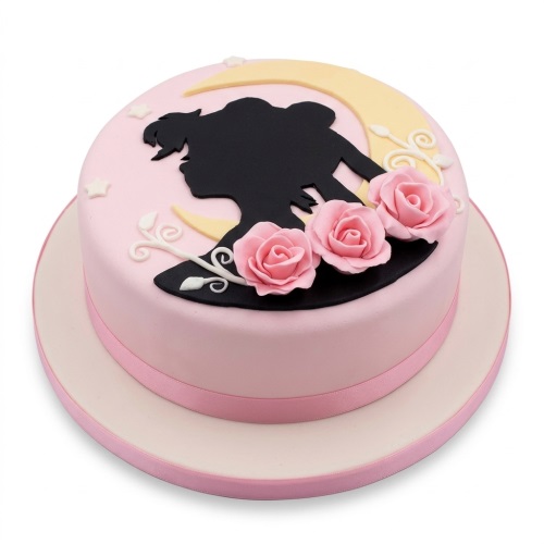 Pink round cake with black Sailor Moon silhouette, yellow crescent moon, white stars, and pink roses.