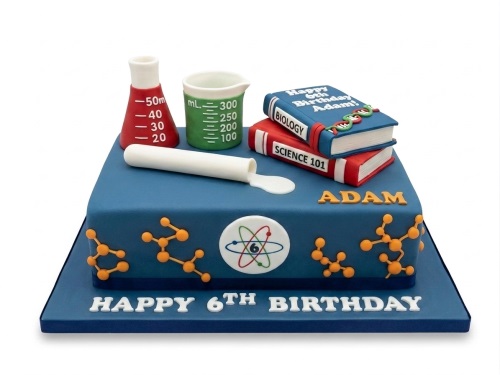Blue square birthday cake with edible science decorations including beakers, books, and an atom symbol, with a custom age and name.
